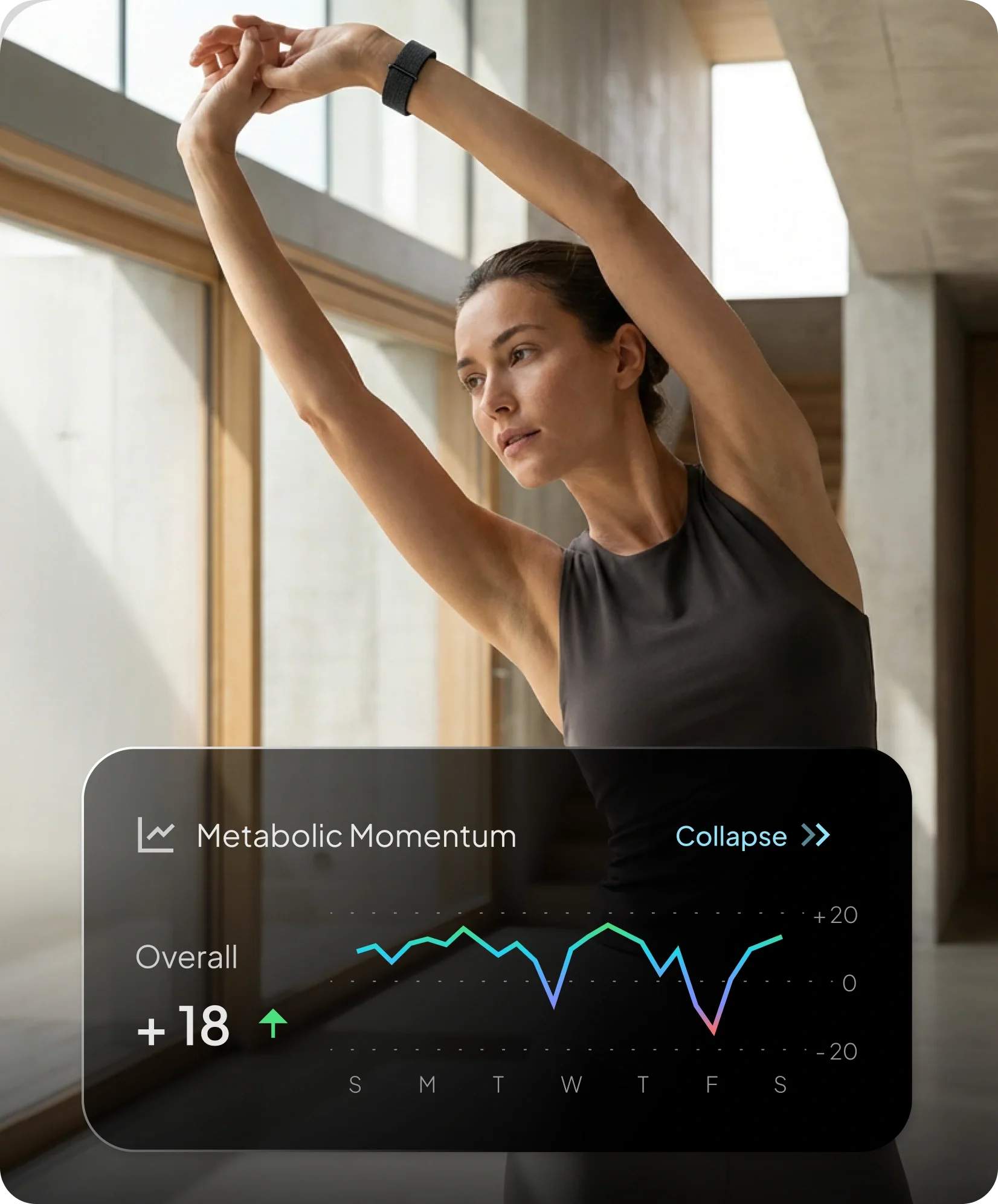Woman stretching while wearing Hume Band with metabolic momentum display
